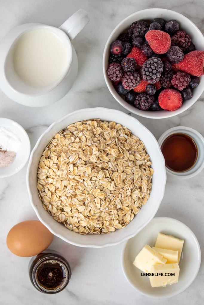 Ingredients of berry baked oatmeal in bowls