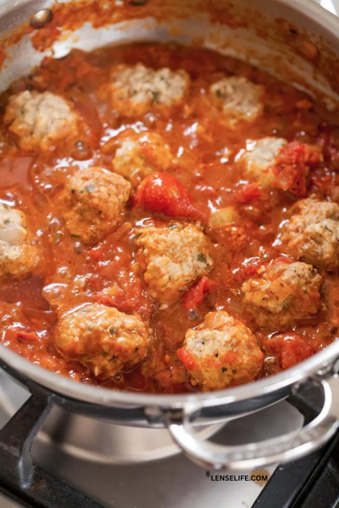 frying the meatballs in a pan