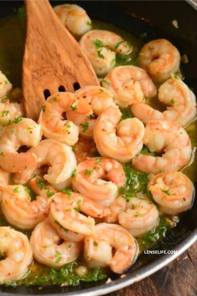 cooking the shrimp on a pan
