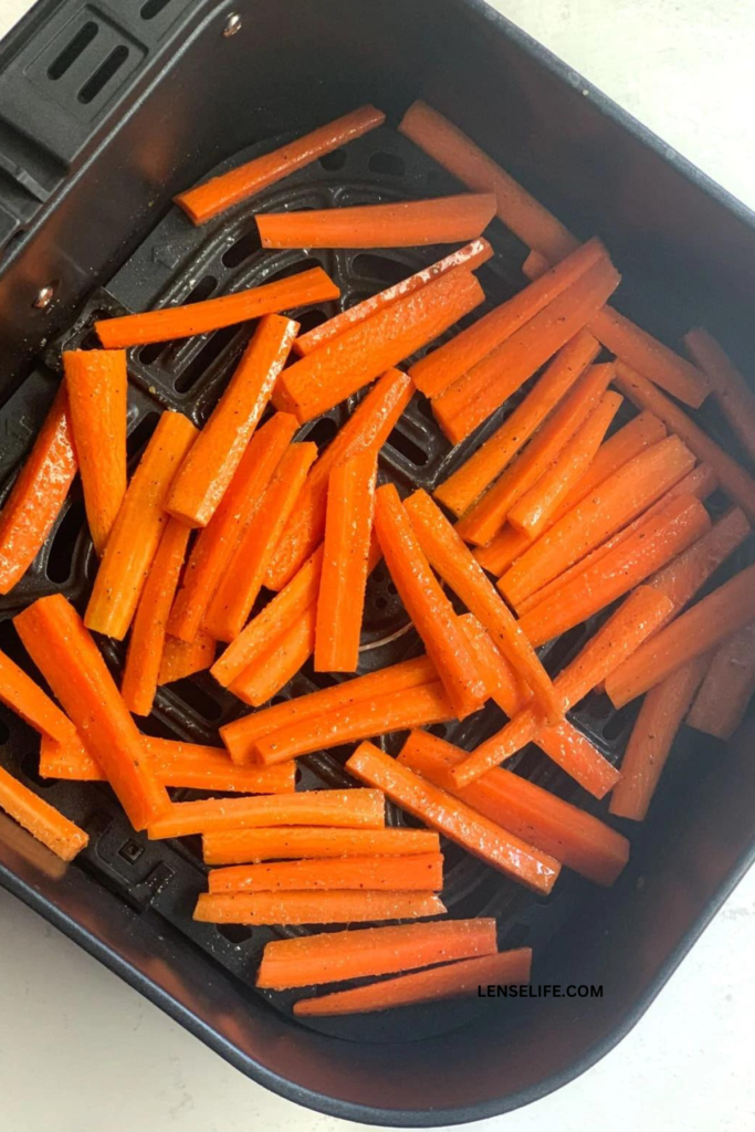 air frying the carrots in the air fryer bucket