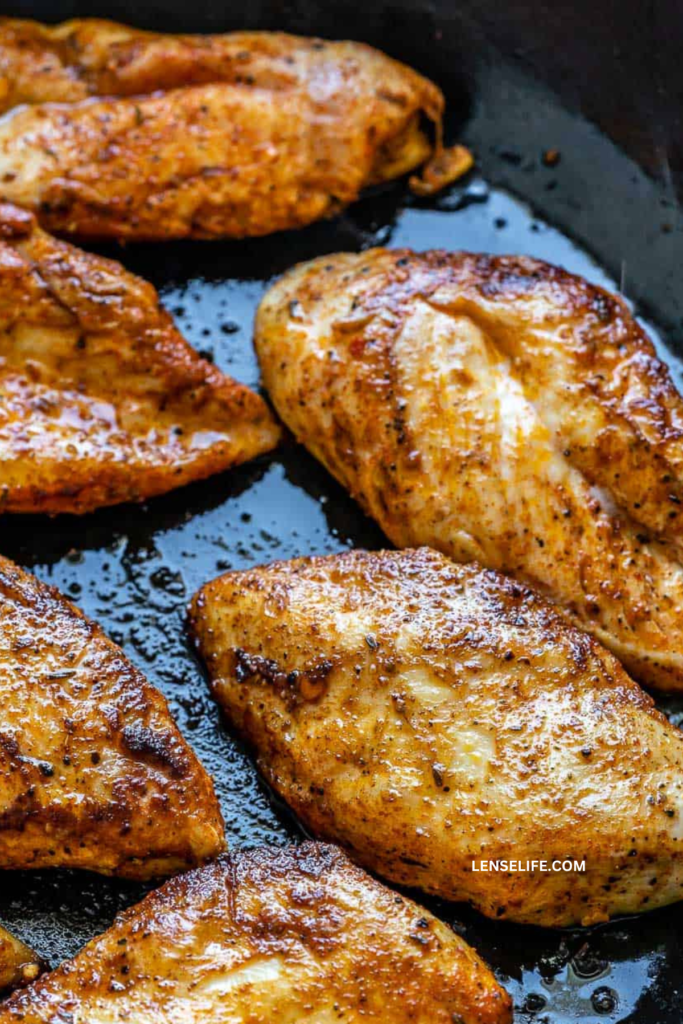 cooking the chicken in a pan