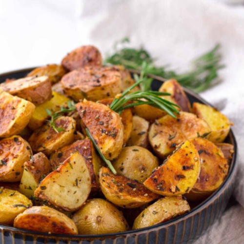 deliciously prepared Garlic Herb Roasted Potatoes in a bowl