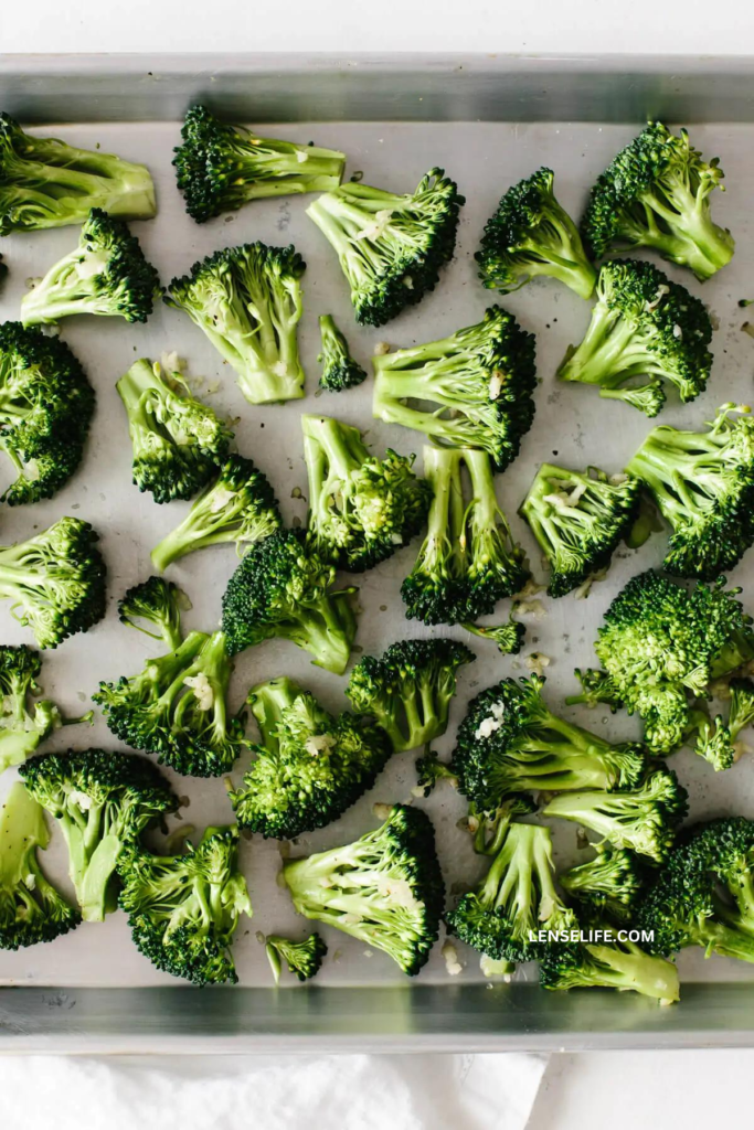 broccoli florets in a baking tray