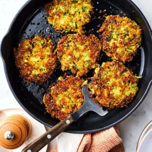 Goat Cheese Zucchini Fritters on a pan