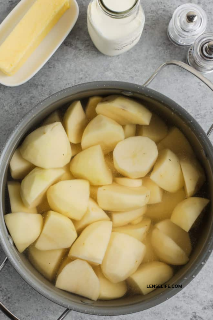 boiling the potatoes in a pot