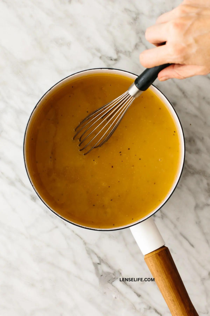 stirring the roux in a pan
