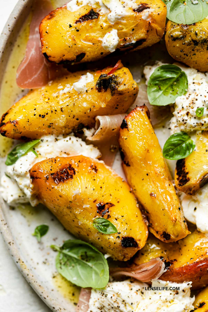 Grilled Peach and Burrata Salad on a plate