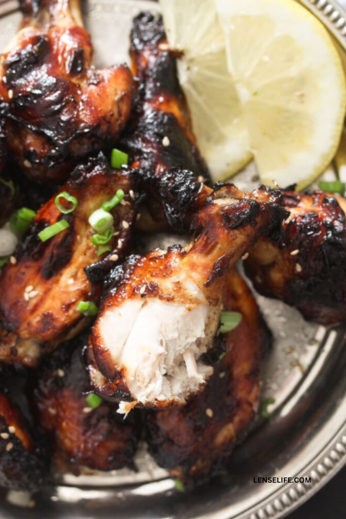 deliciously prepared Soy Garlic Ginger Chicken Wings
in a plate