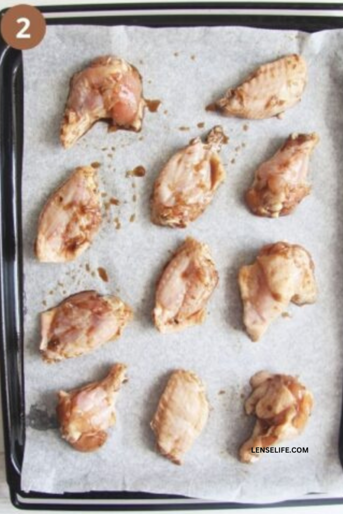 seasoned chicken in a baking tray