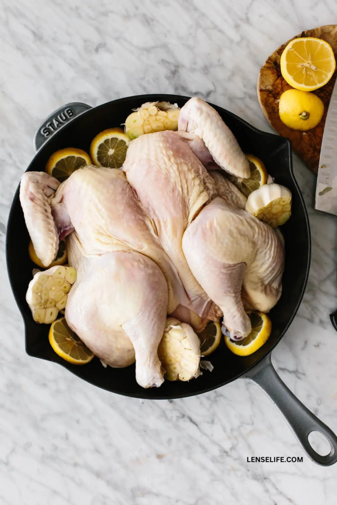 Lemon Garlic Spatchcock Chicken in a pan