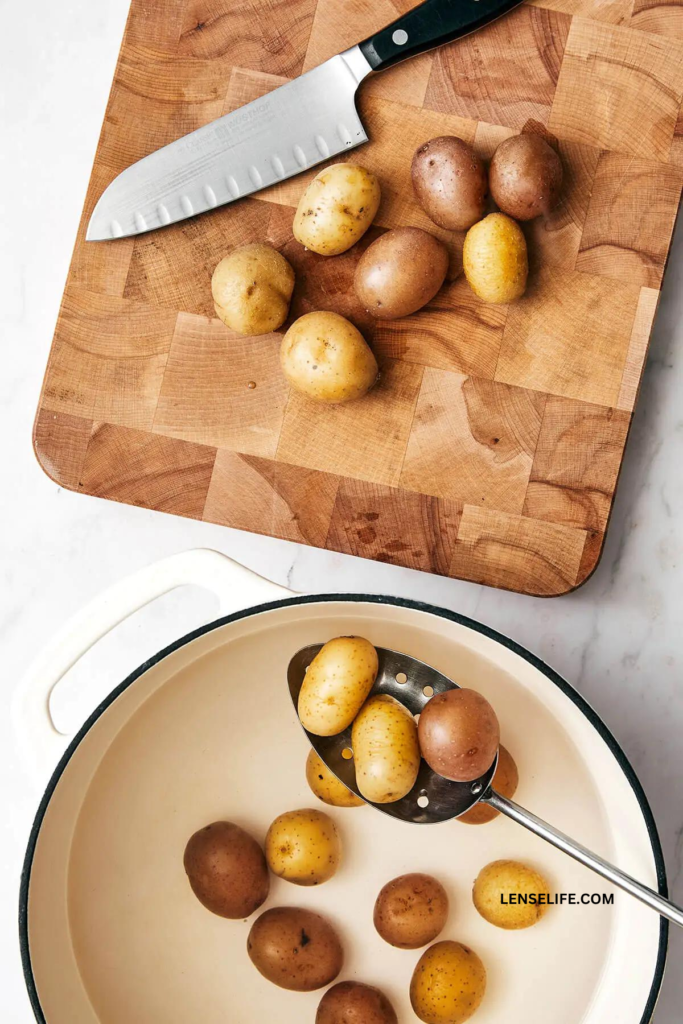 potatoes in a cutting board