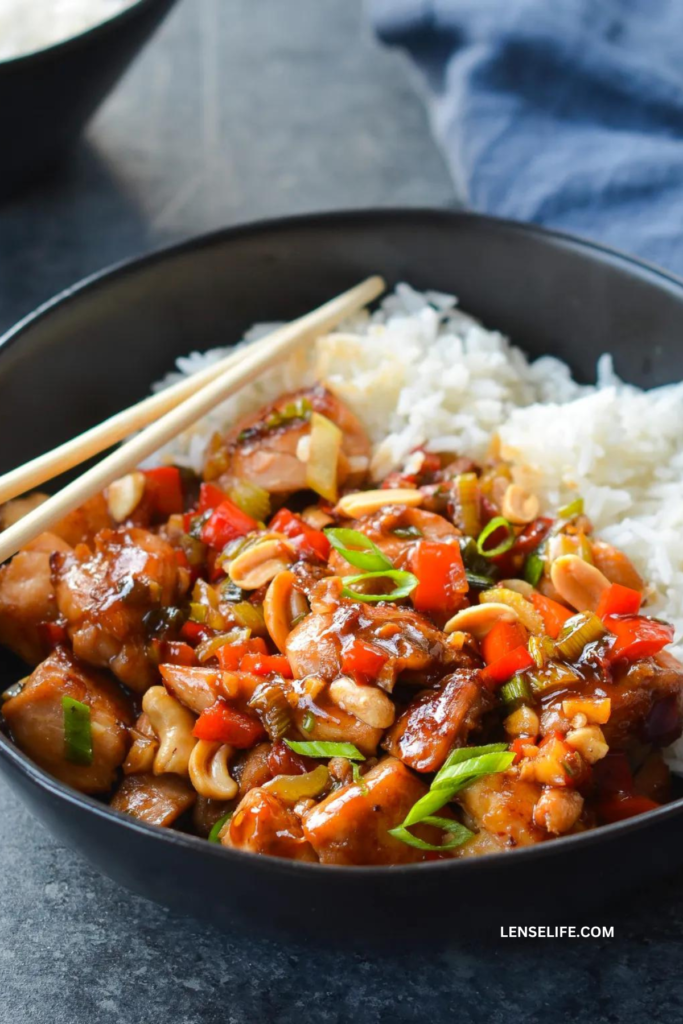 Kung Pao Chicken served with rice in a bowl