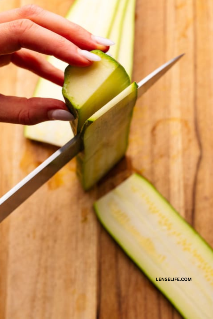 cutting the zucchini into slices